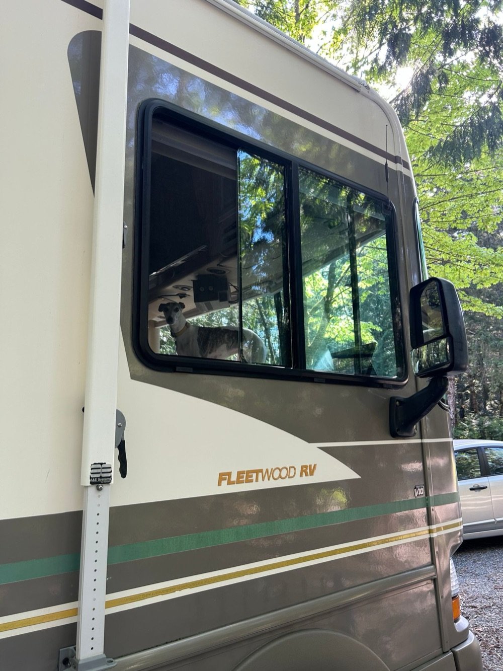 Detailed Fleetwood RV with clean windows and glossy paint